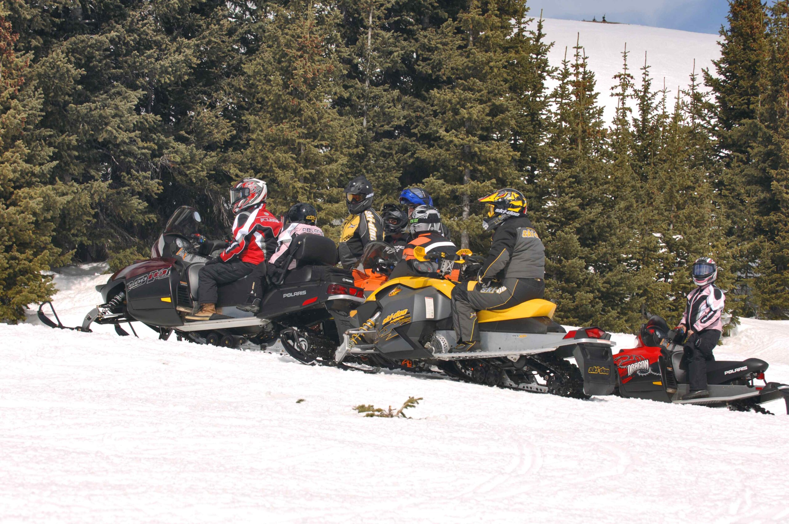 Group of riders enjoying their snowmobile Ontario experience.