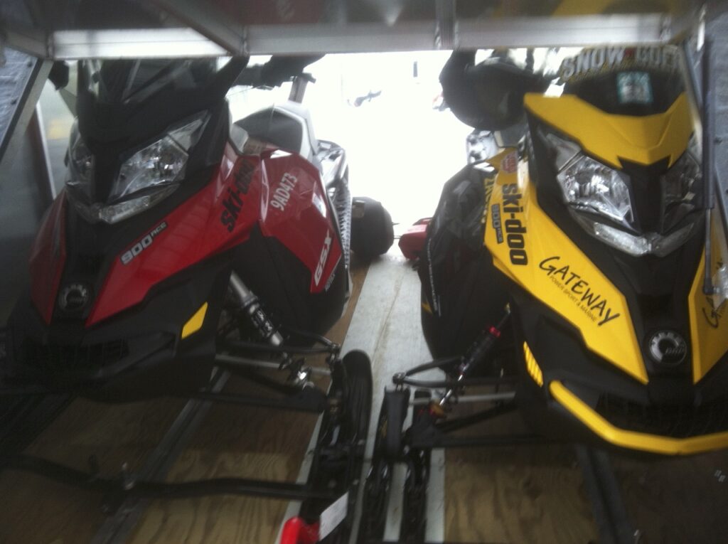 own a snowmobile trailer to keep sled protected and clean