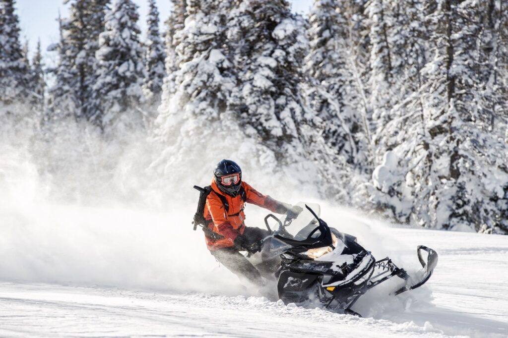 Deep powder snowmobile backcountry riding