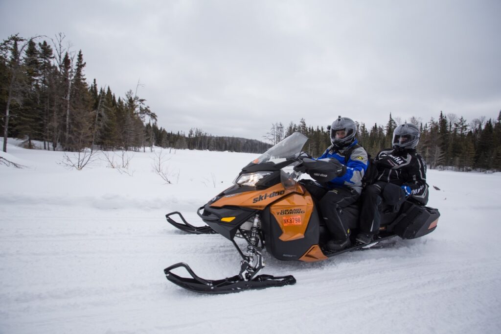 snowmobiling double with passenger