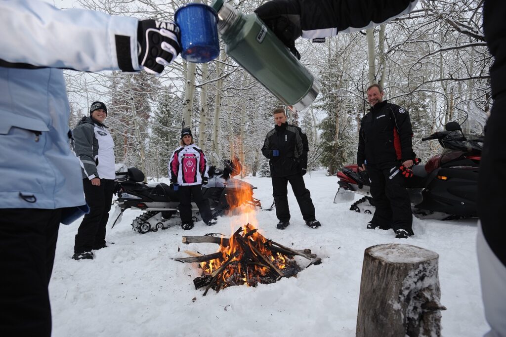 Staying warm while snowmobiling is more difficult during outdoor lunch.