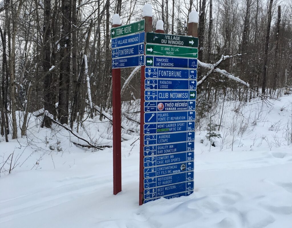 Service name signs are important snowmobile trail signs