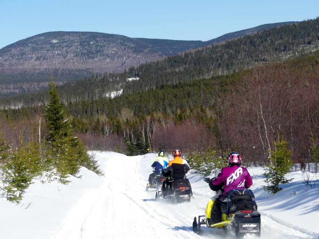 Mountainous terrain riding to snowmobile New Brunswick Northern Odyssey