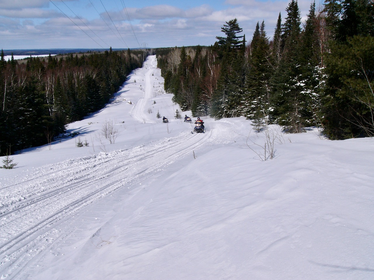 Snowmobile Algoma TOP Trail D includes great power line riding.