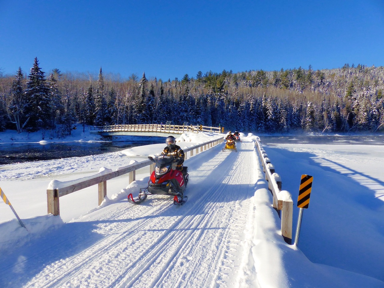Unique curved snowmobile bridge in the Lanaudière Region of Quebec.