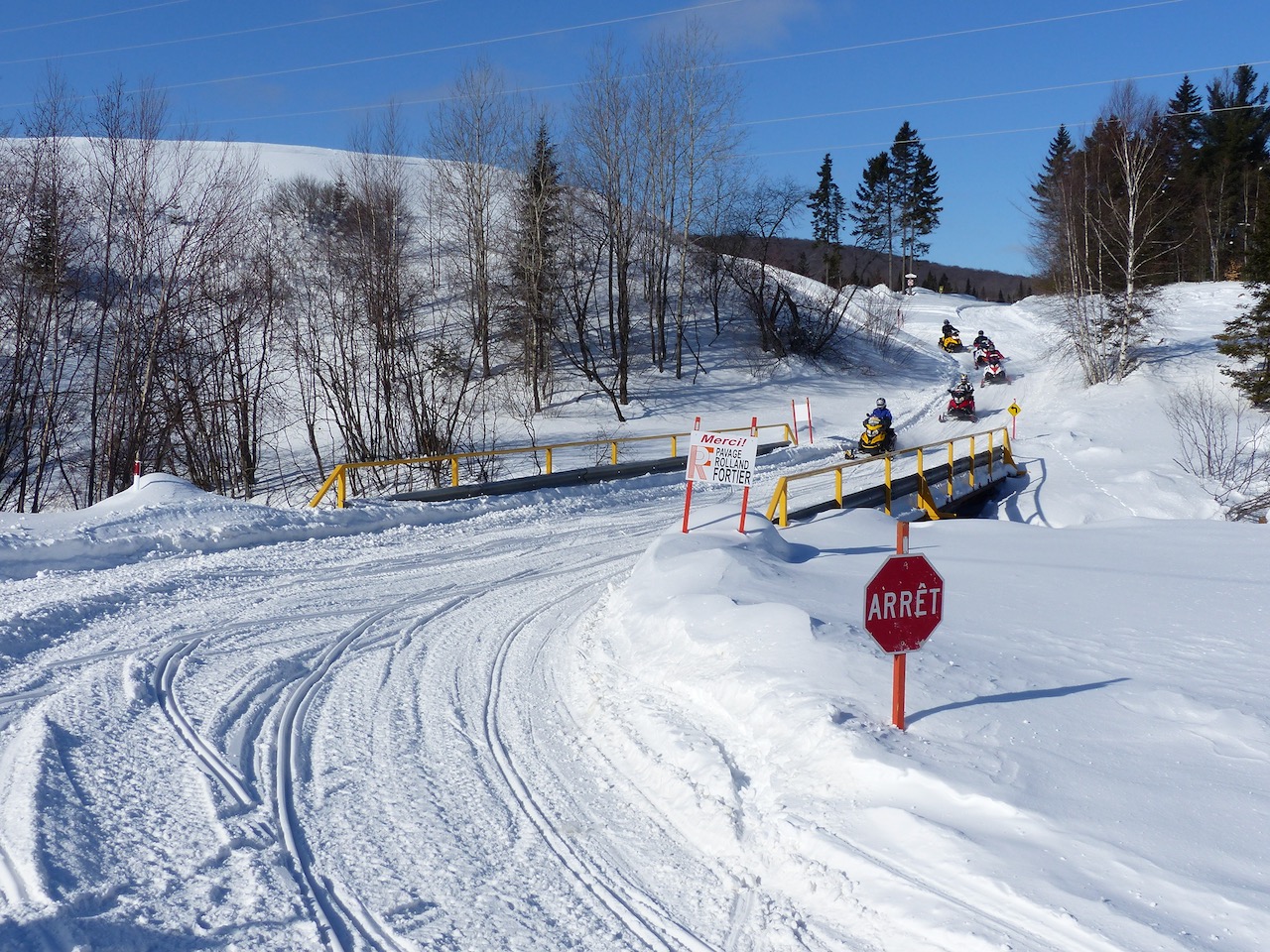 Many snowmobile trails around Quebec City use utility corridors and go under power lines.