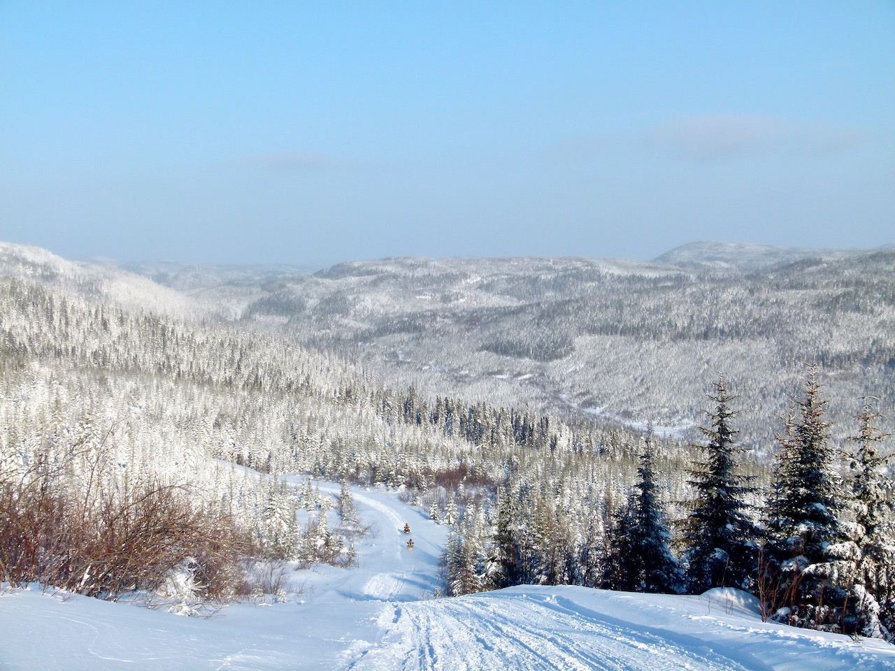 Monts-Valin welcomes snowmobilers with awesome sceney to the Saguenay-Lac-Saint-Jean Region of Quebec.