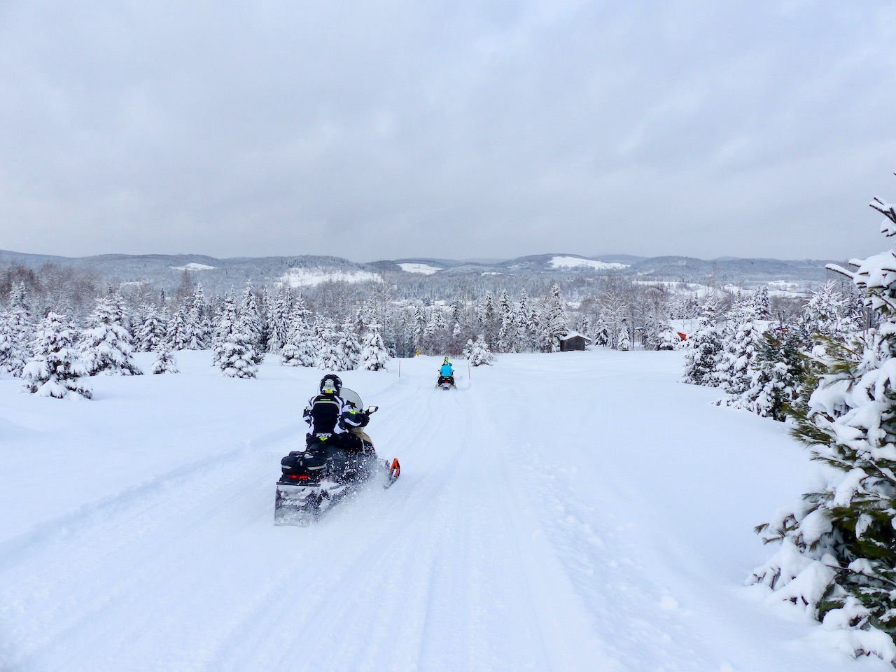 Snowmobiling thru the eastern Laurentian Mountains in the Mauricie Region of Quebec.