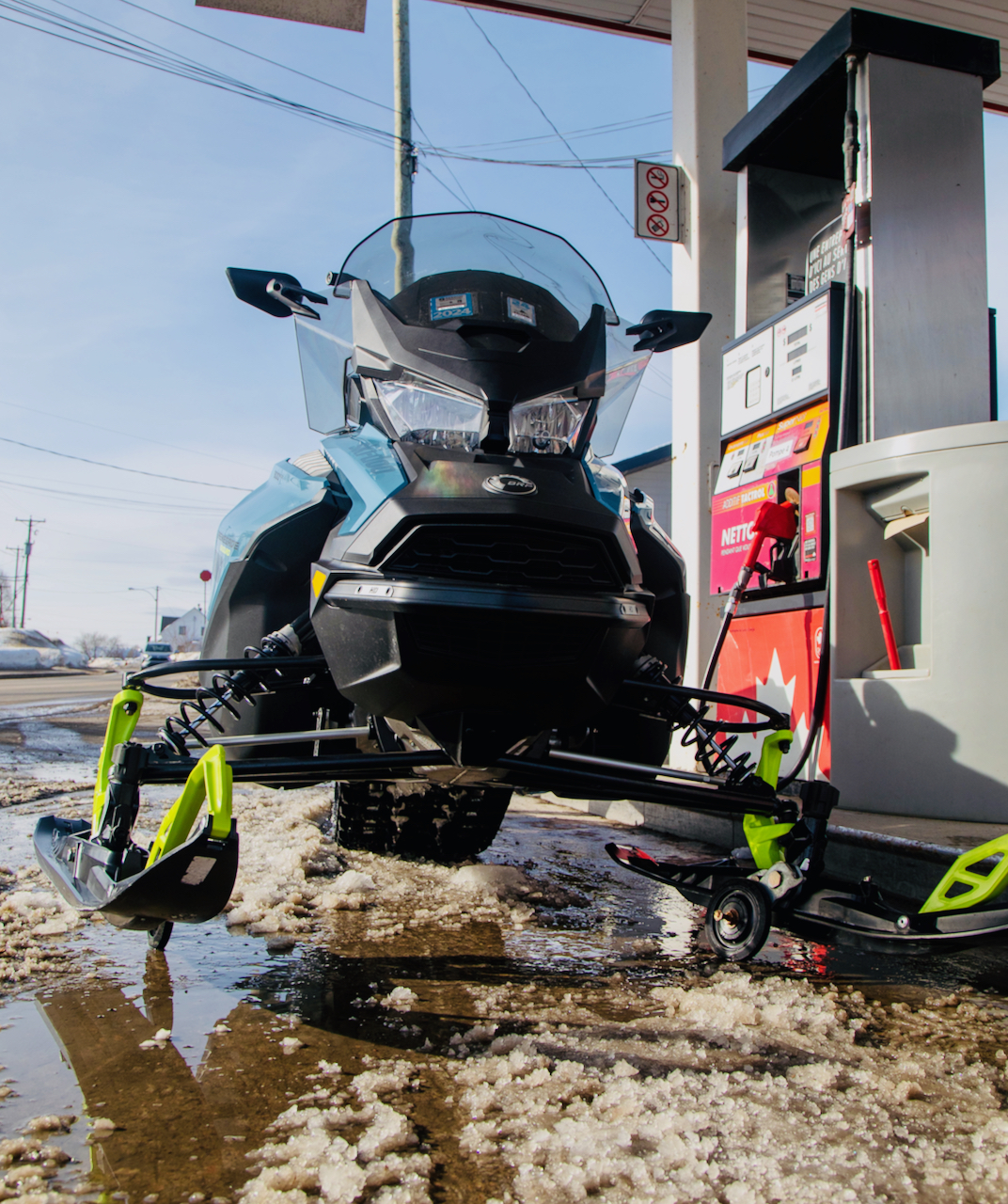 Getting sled into position to fuel up using Rollerskis.