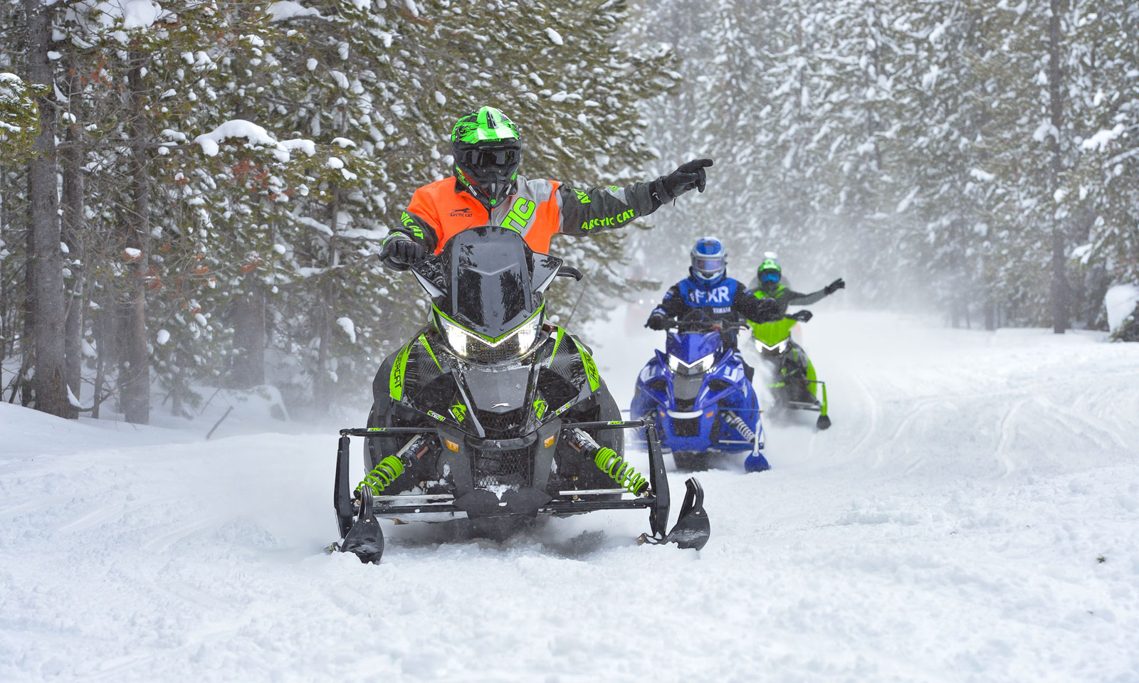 These snowmobile hand signals should be used by all riders in your group.